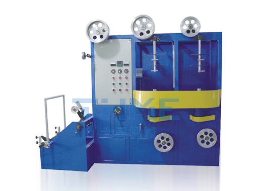 Vertical tape wrapping machine